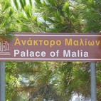 Roadside sign 'The Palace of Malia' (image by Phileole)